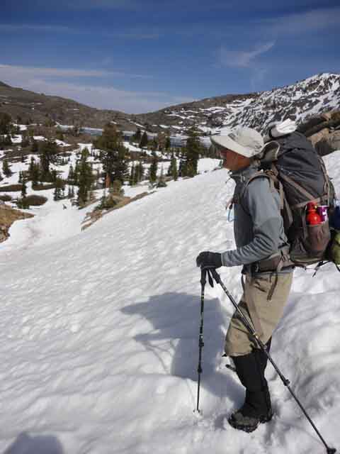Scott Turner, Rich, and Melika backpacking through Snow to Round Top lake.